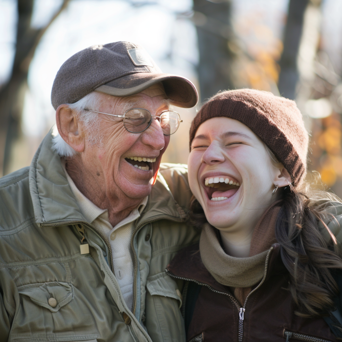 A grandfather-granddaughter duo laughing | Source: Midjourney