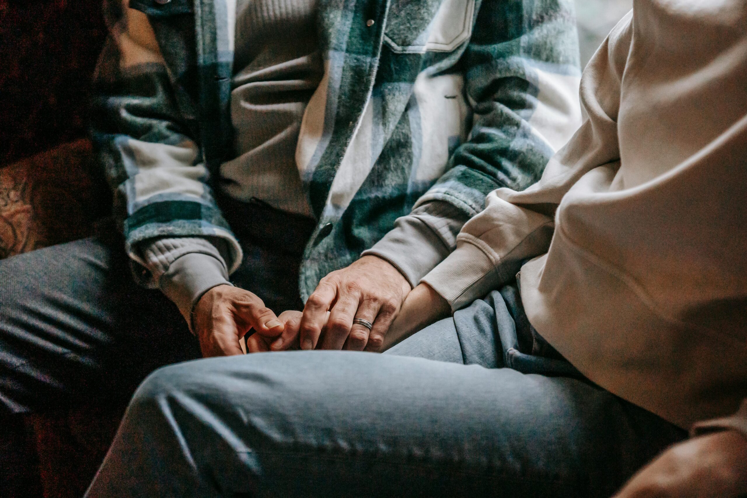 A man holding a woman