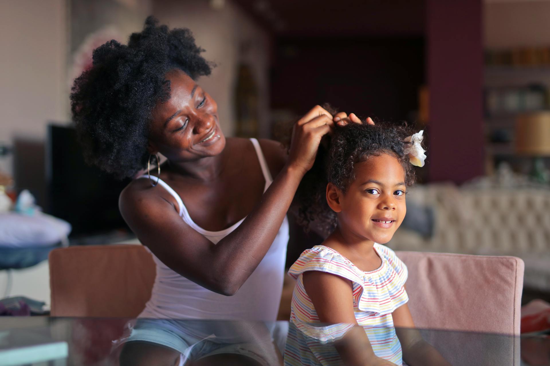 Woman fixes her daughter