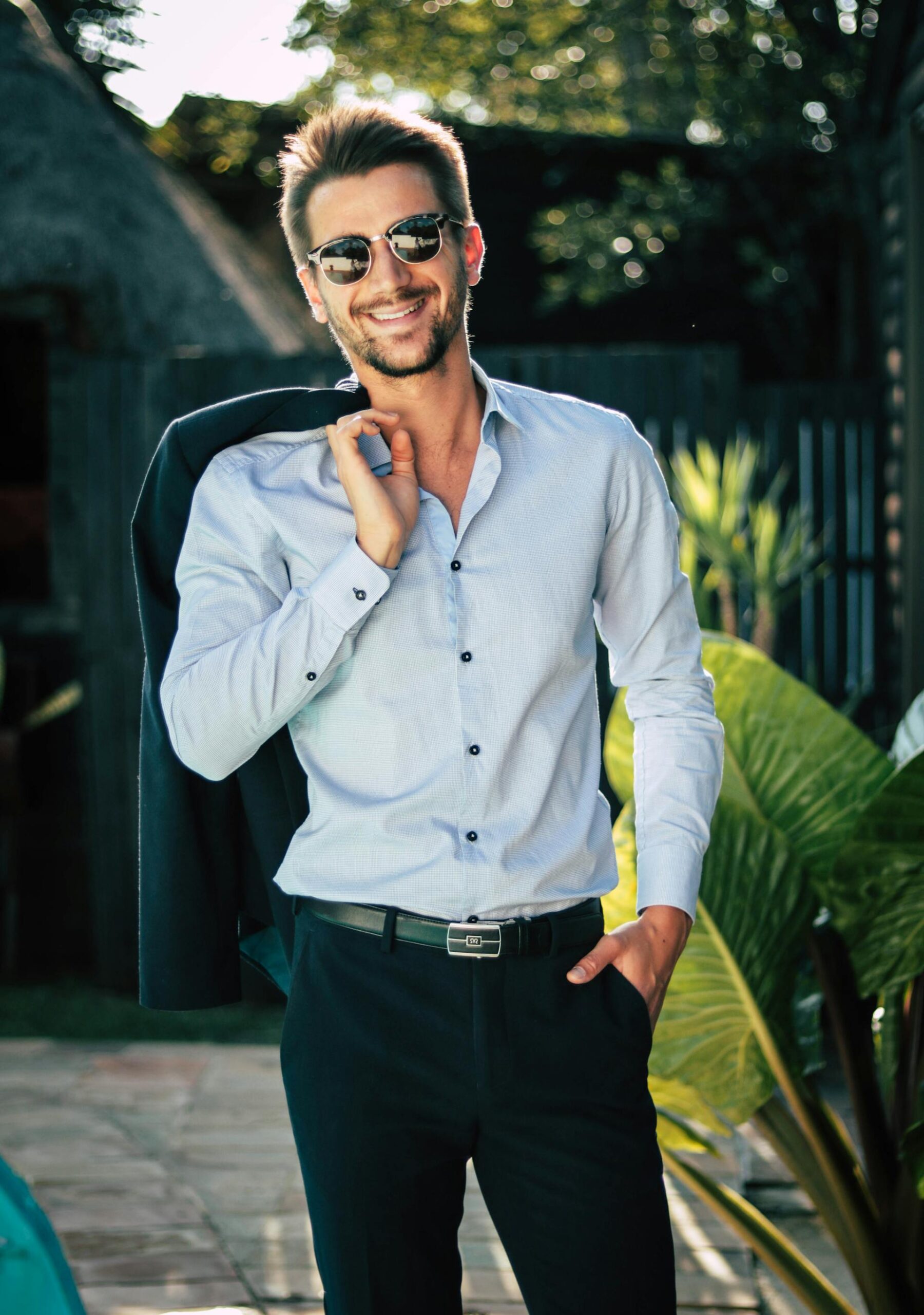 A smiling man in a suit | Source: Pexels