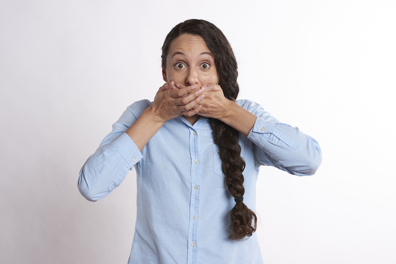 A shocked woman with her hands over her mouth | Source: Pixabay