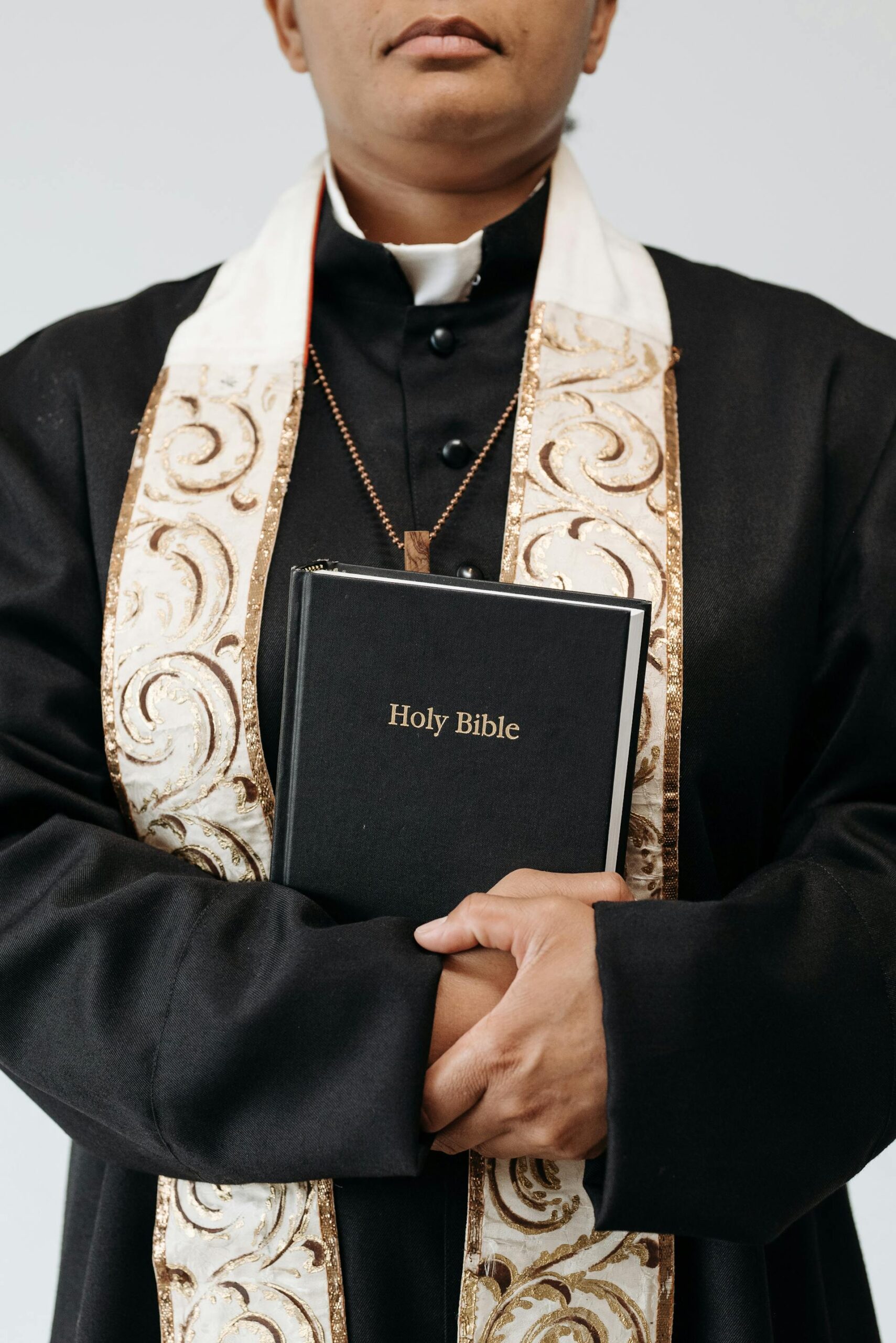 Person holding a Bible | Source: Pexels