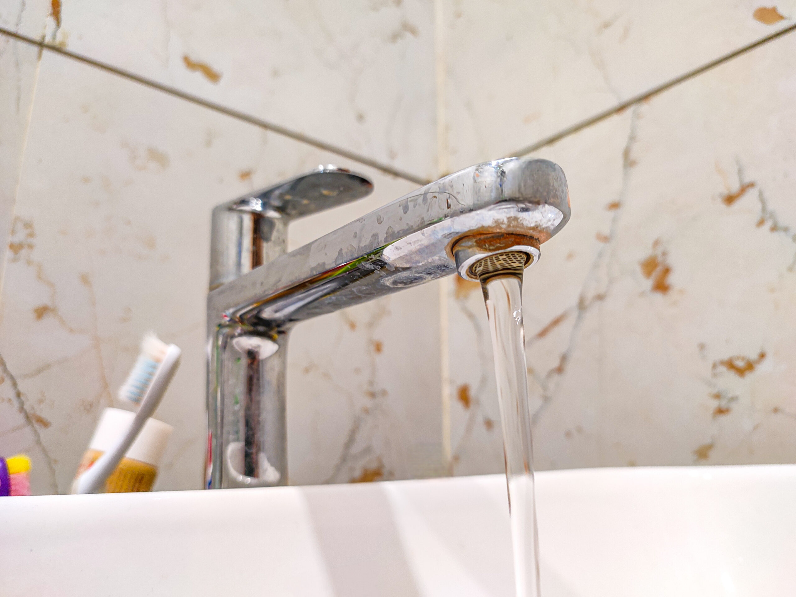 Water running from a tap | Source: Getty Images