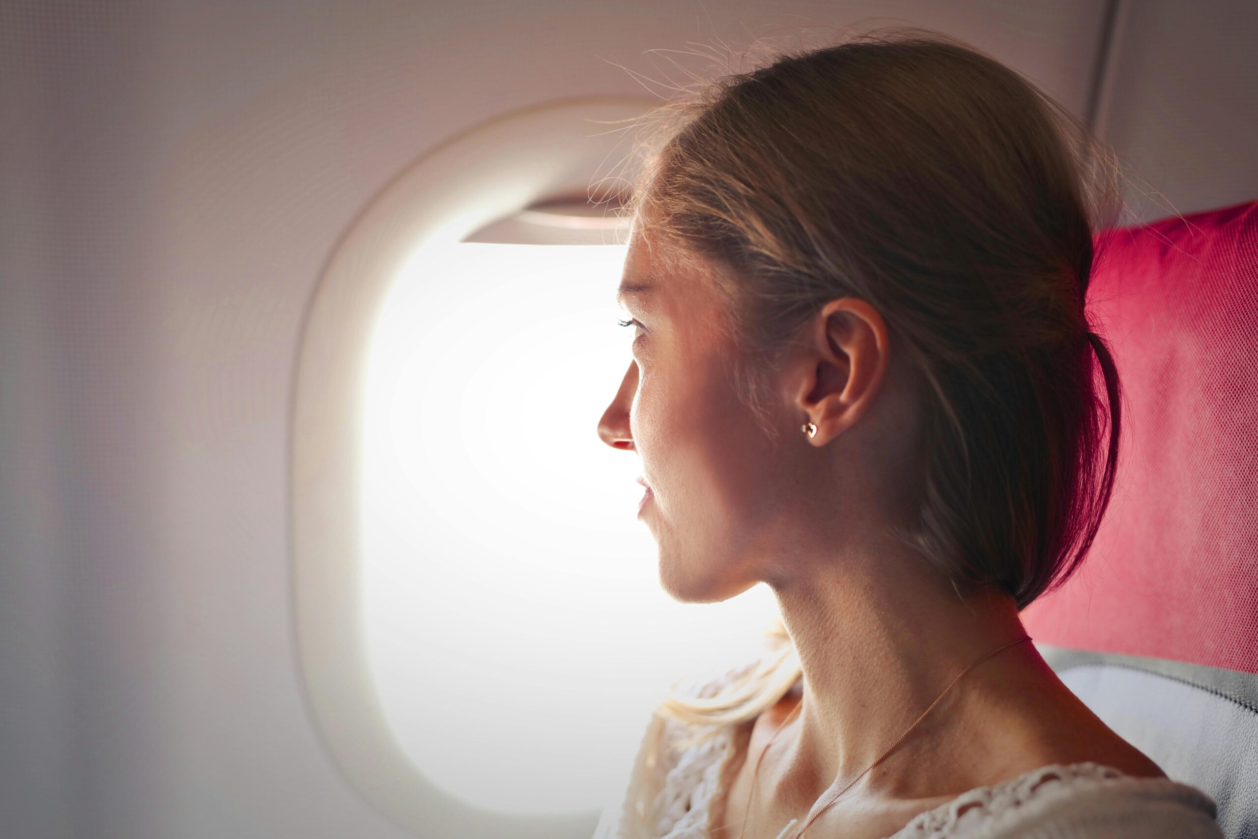 Unruly Child Keeps Spitting in Woman's Face on Plane – Her Response Sparks Heated Debates