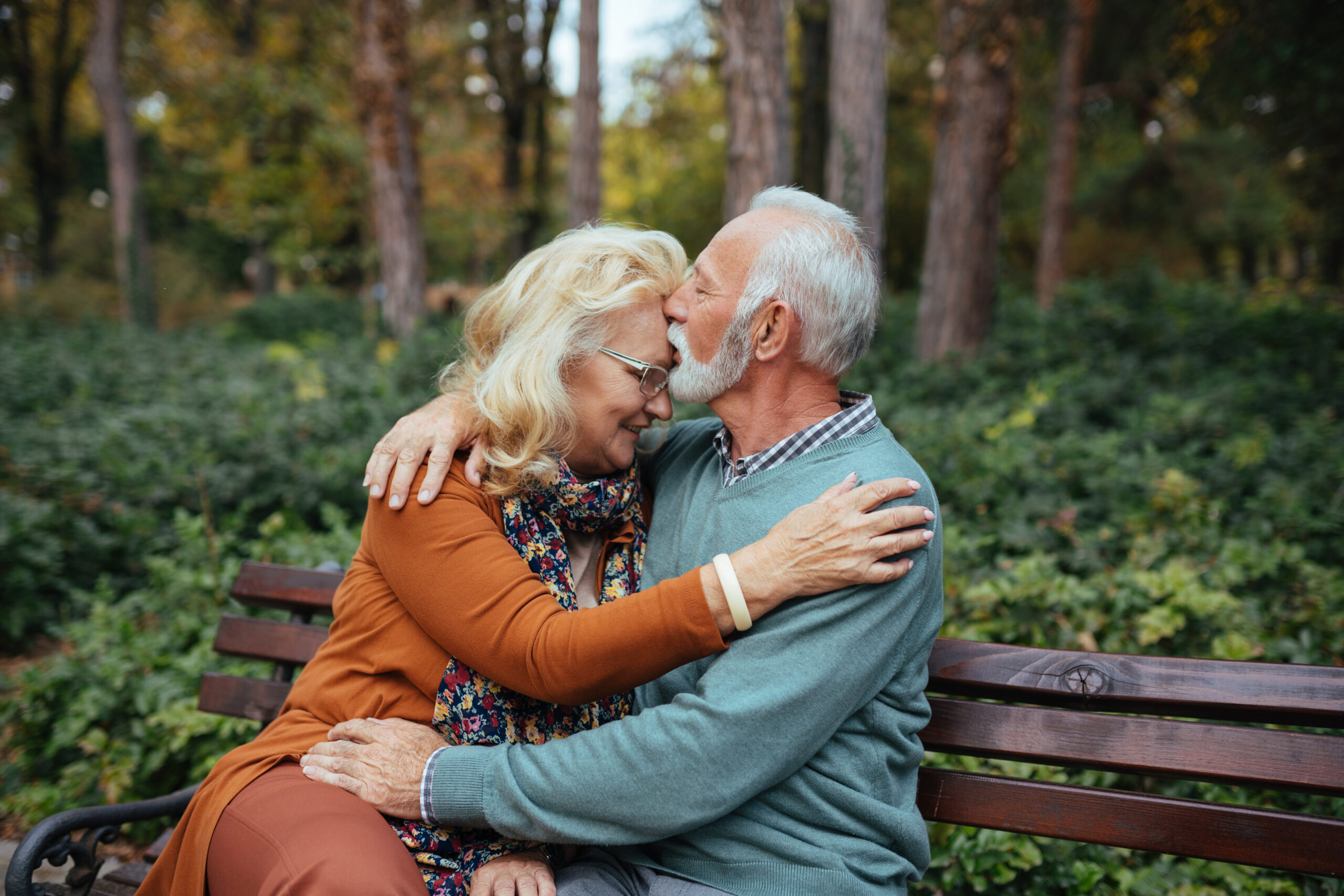 A man kissing a woman