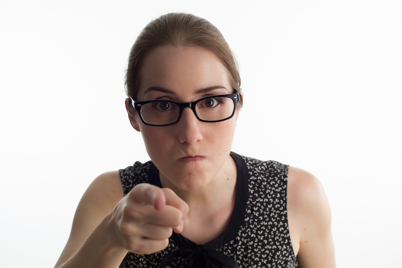 An angry woman pointing at the camera | Source: Pixabay